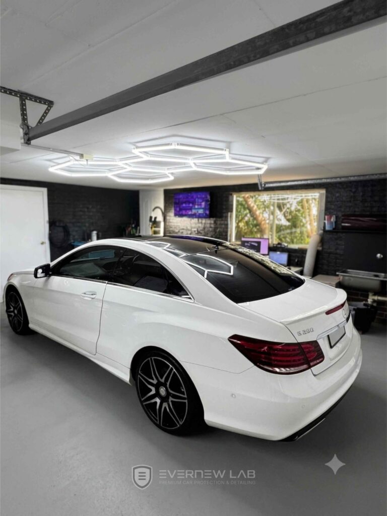 White Mercedes-Benz E 250 Coupé after professional graphene coating and luxury car detailing in Sydney.