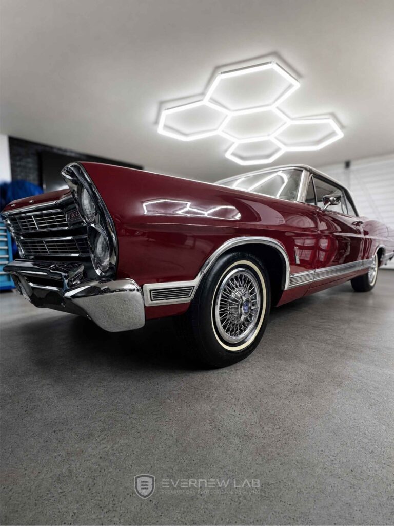 Classic 1967 Ford Galaxie XL with polished burgundy paint after luxury car detailing and paint correction in Sydney.