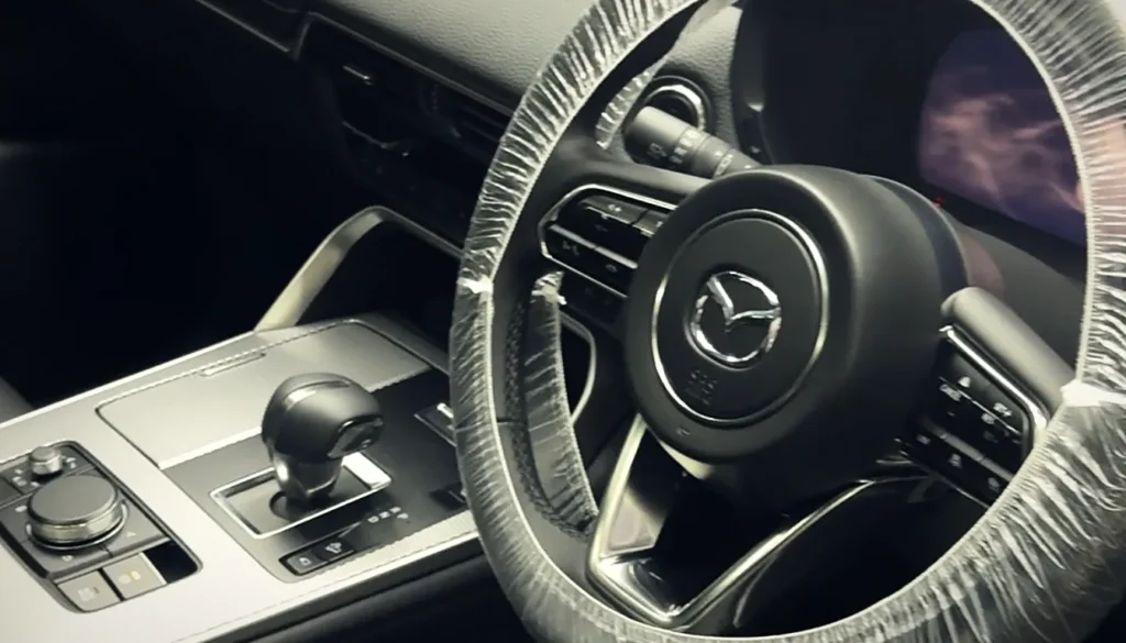 Interior car detailing in Sydney – Mazda cabin with protected steering wheel after a deep clean at EverNew Lab studio, Baulkham Hills